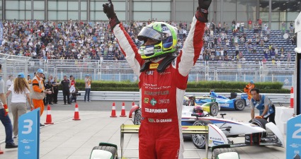 as di Grassi celebrates winning the first ever Formula E race in Beijing.