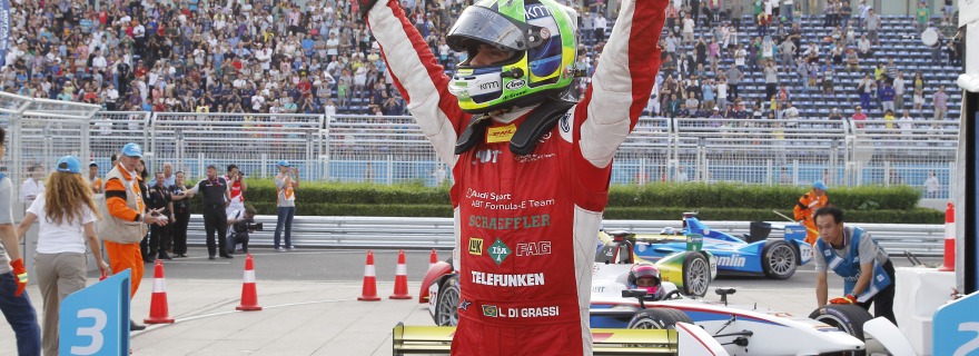 as di Grassi celebrates winning the first ever Formula E race in Beijing.